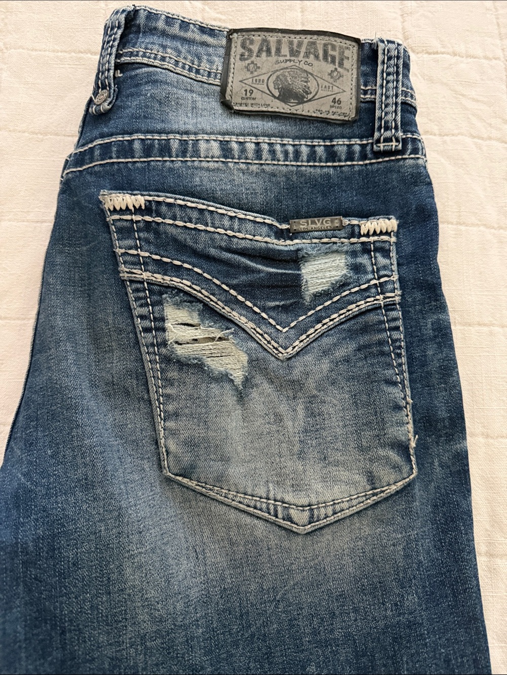 Salvage Faded Blue Denim Jeans with Distressed Back Pocket